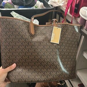 Michael Kors tote bag brand